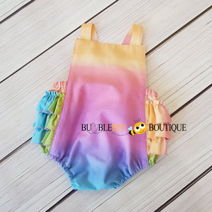 Pastel Rainbow gradations Girls Cake Smash Outfit - Frilly romper  Yellow/pink tones front view